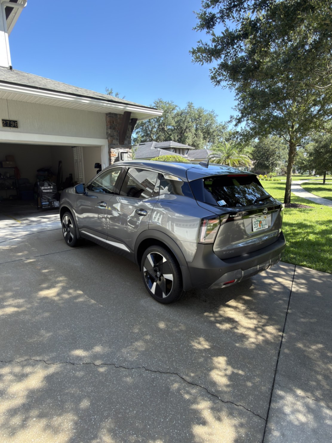 Rear view of gray Nissan Kicks after Overtime Detailing service
