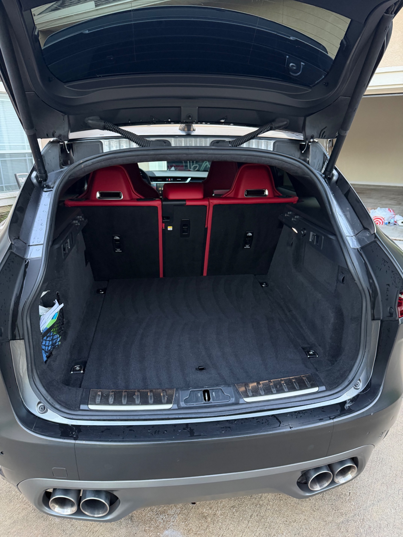 Jaguar cargo area vacuumed and cleaned edge to edge
