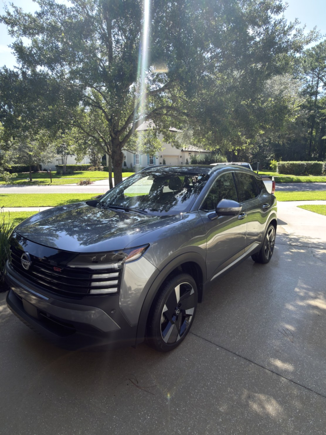 Gray Nissan Kicks SR after full exterior detail